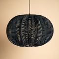 Black rattan pendant beige background