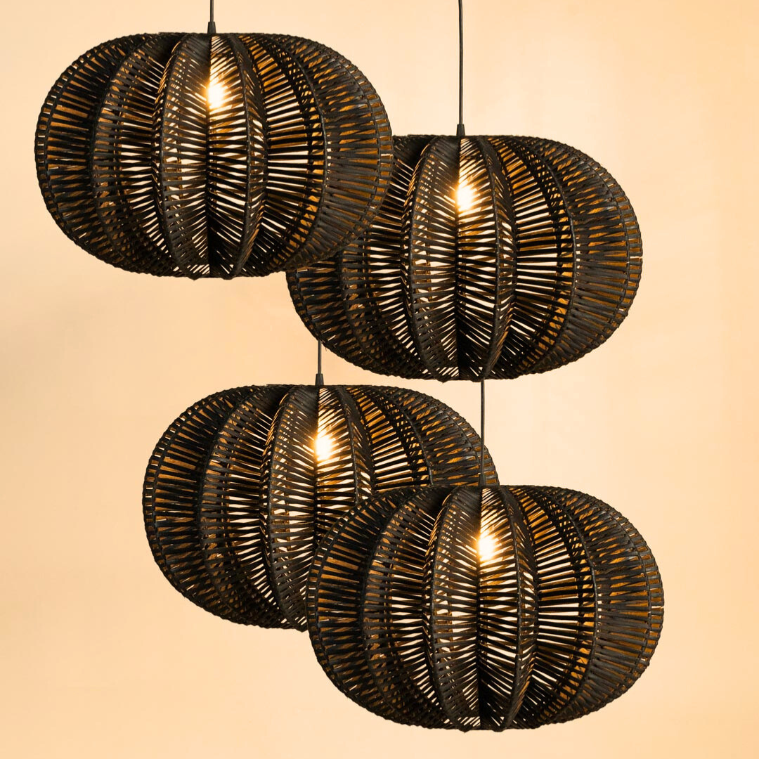 Multiple black rattan pendant lamps